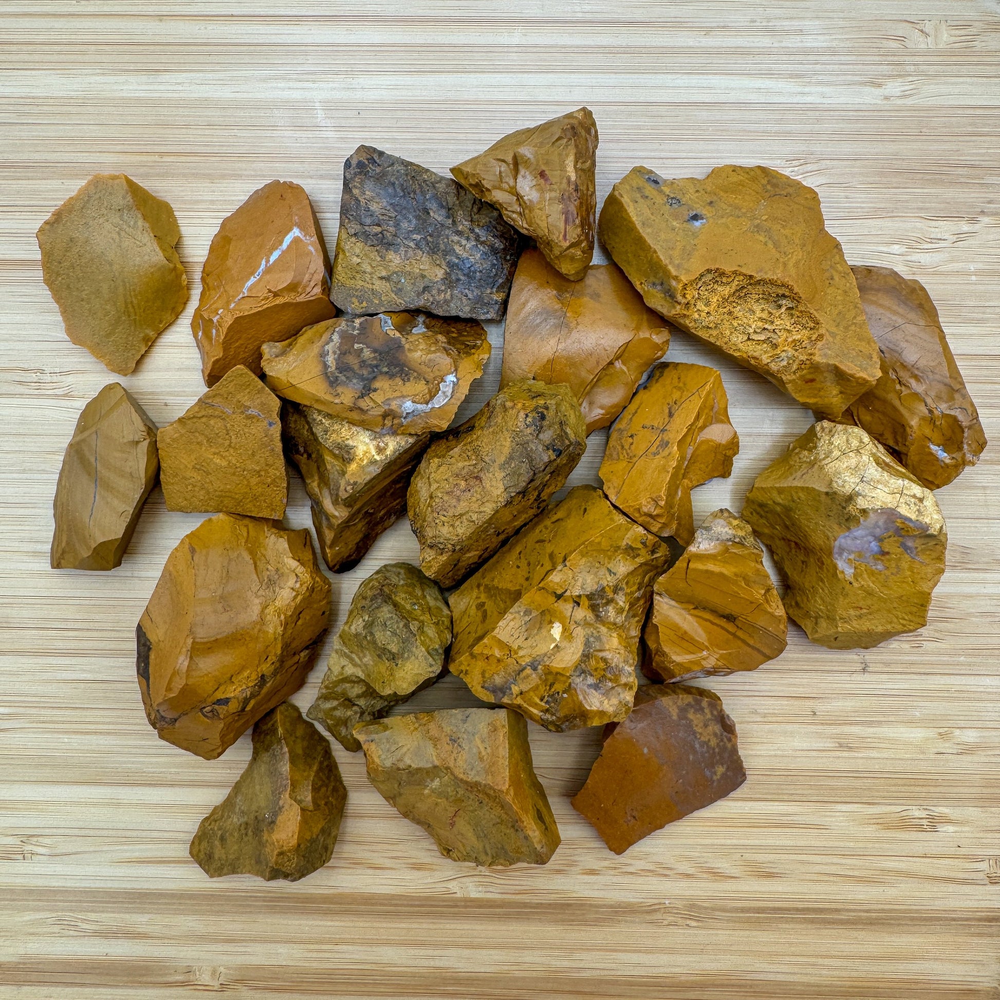 Detail capture of Yellow Jasper raw stone, showing untreated character.