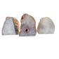 Three standing agate candle holders from Brazil with polished banded faces and natural rind