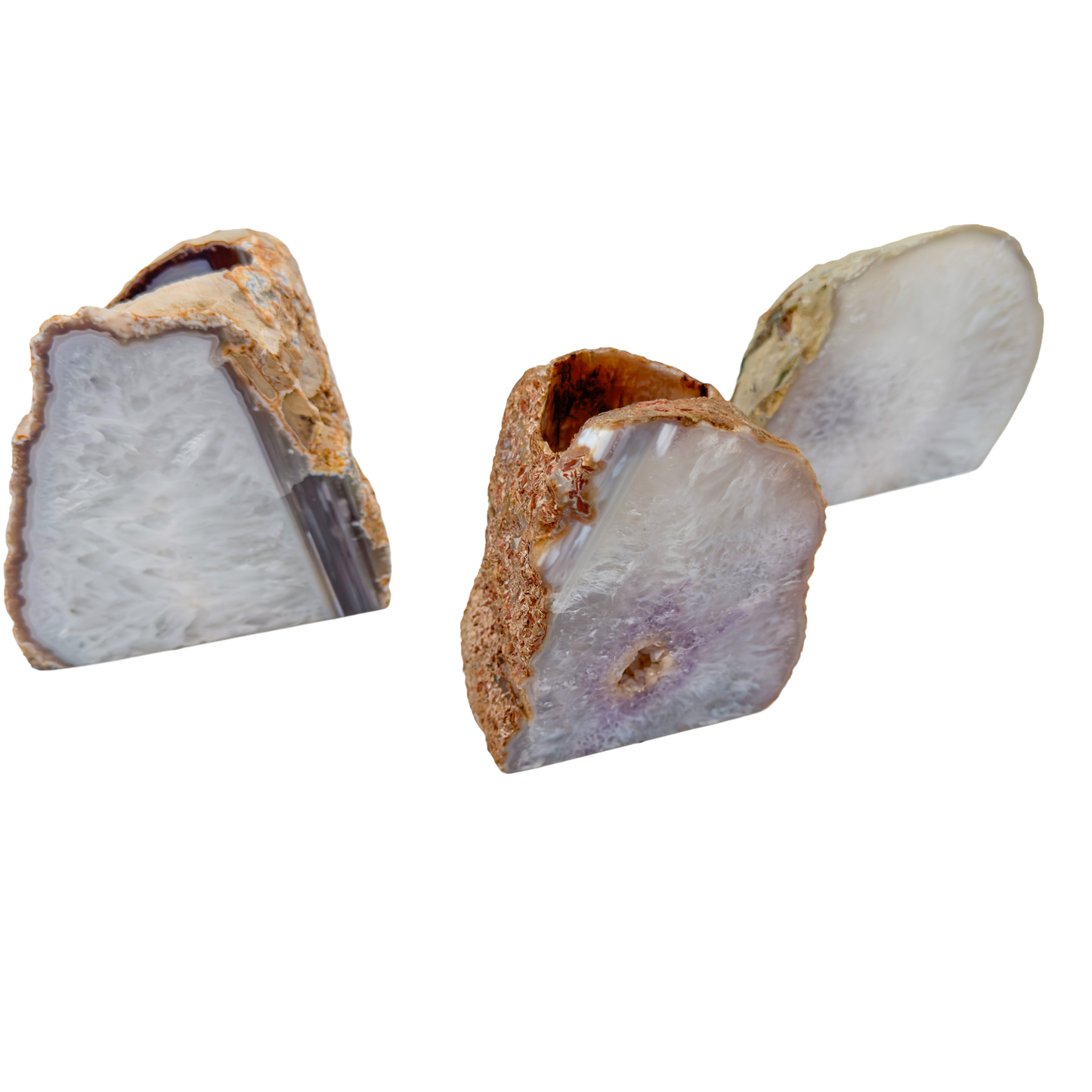 Agate candle holders angled to show the drilled tea light wells cut into the top