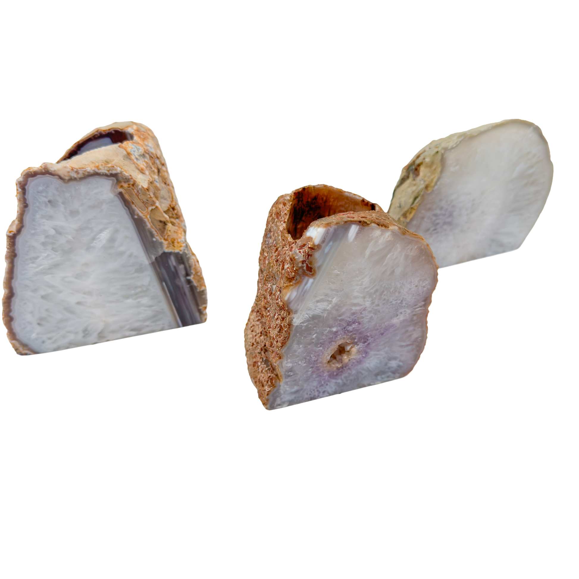 Agate candle holders angled to show the drilled tea light wells cut into the top