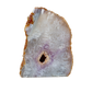 Agate candle holder with a natural vug opening and violet wash across the polished face