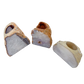Agate candle holders tipped forward showing the drilled wells sized for standard tea lights