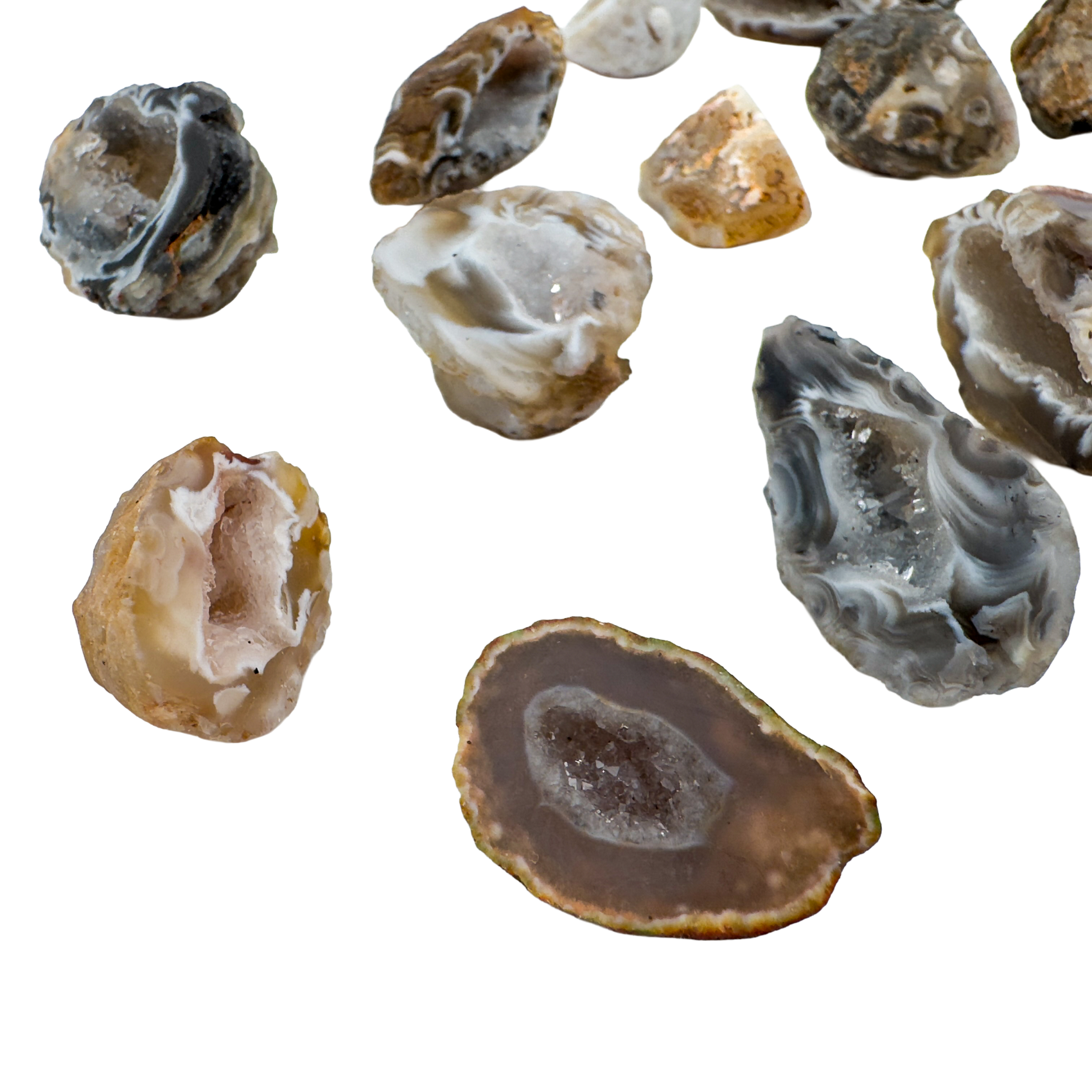 Close grouping of multicolored Agate geodes from Minas Gerais, banded patterns formed in volcanic cavities