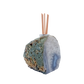 Agate stone reed diffuser showing natural rind alongside the polished banded face