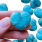 Detail shot of Grade AA Amazonite heart under natural light.
