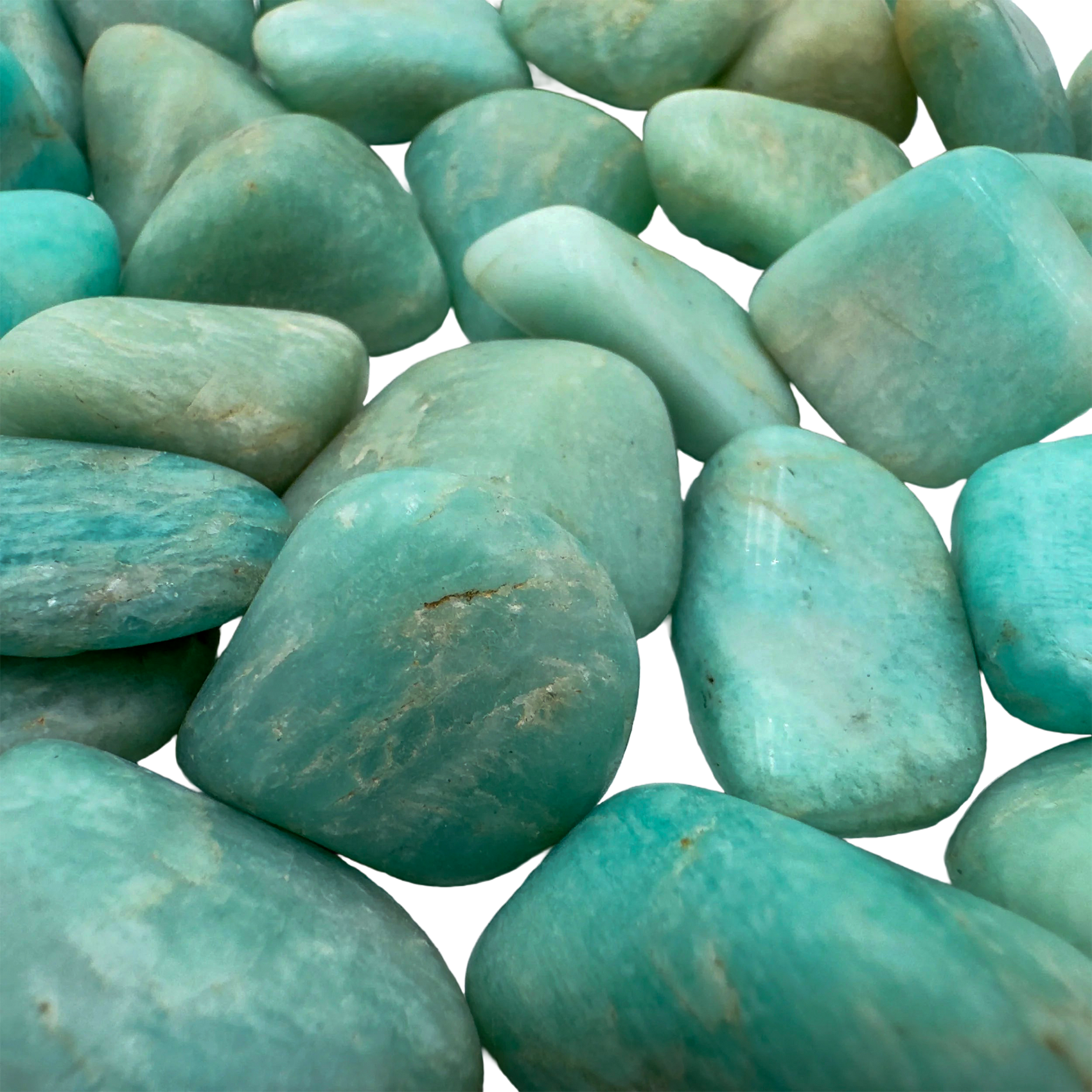 Macro shot of Amazonite tumbled stone, AA Grade, from Minas Gerais, Brazil, showing surface texture and natural inclusions.