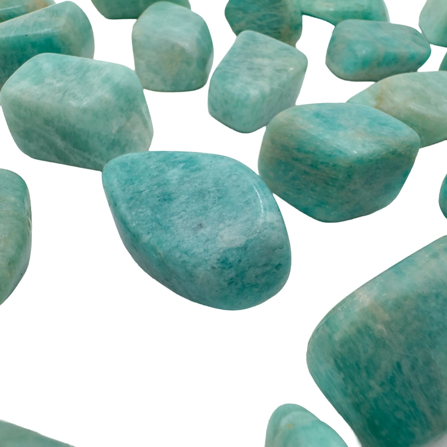 Polished Amazonite tumbled stone showing blue-green color and white feldspar streaks
