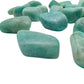 Close-up of polished blue-green Amazonite tumbled stones from Mozambique