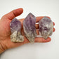 Top-down shot of purple Amethyst raw point, showing characteristic color.