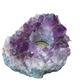 Amethyst candle holder viewed from above, drilled centre well surrounded by raw quartz points