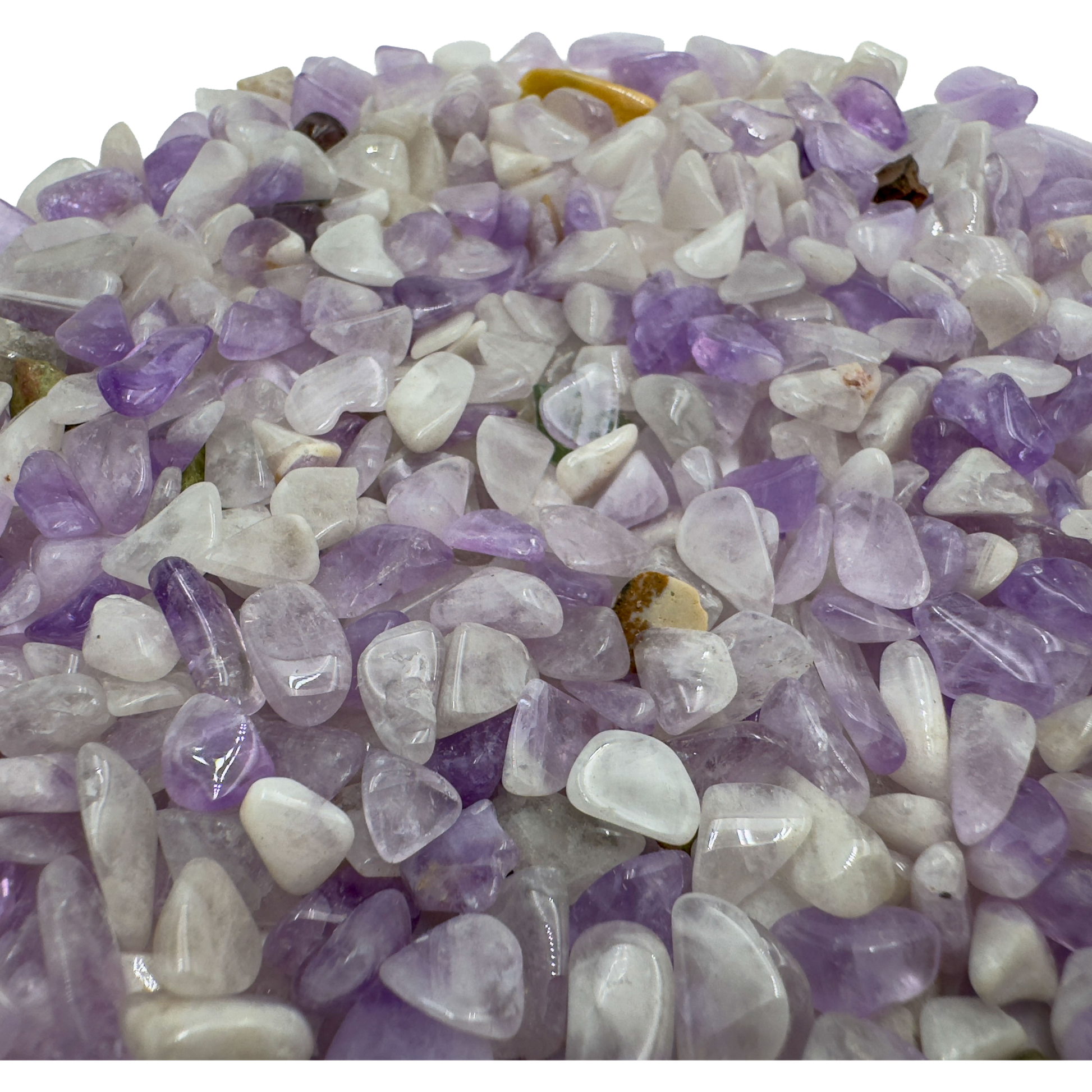 Amethyst chips scattered on surface, ethically sourced Madagascar quartz chips