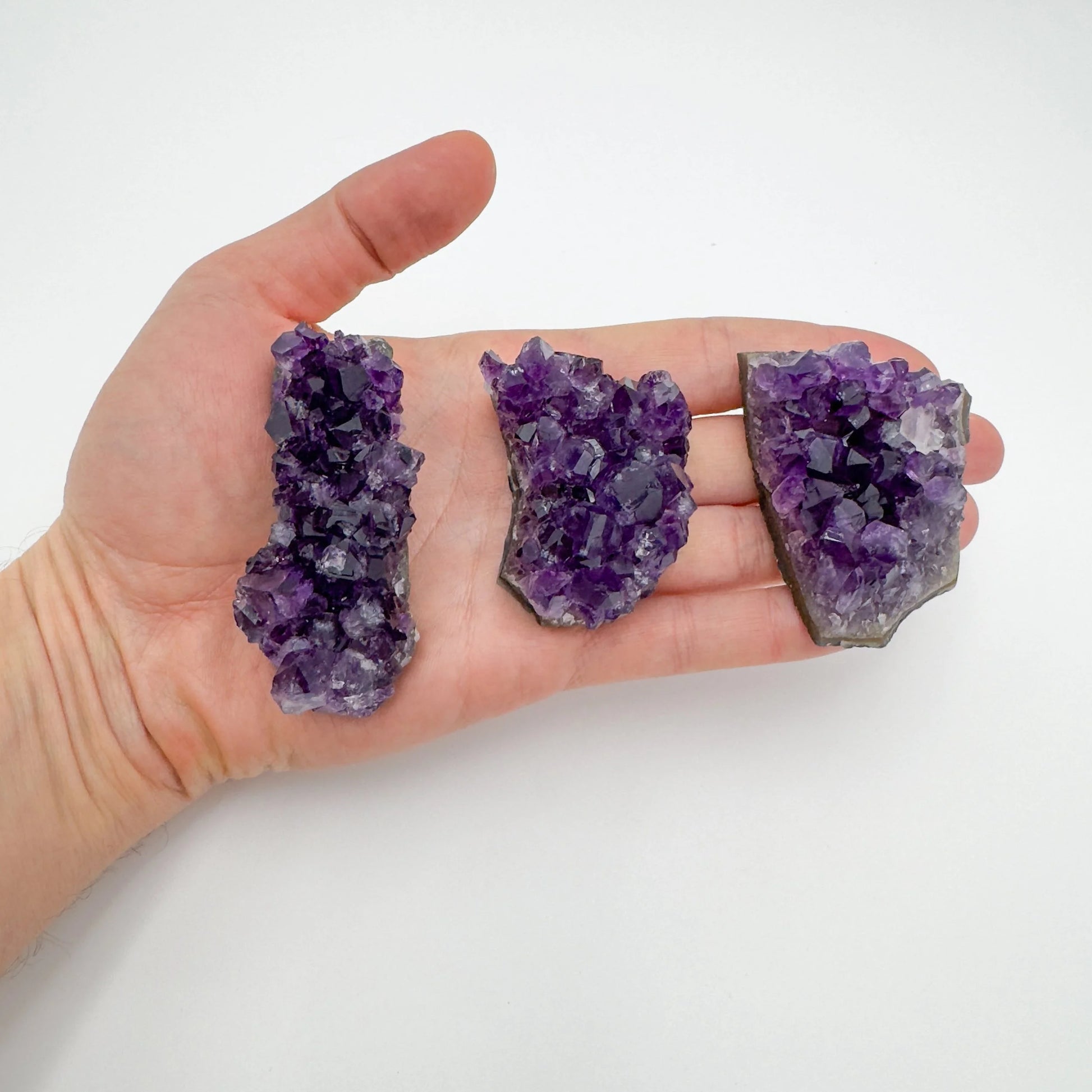Back view of Grade AA Amethyst cluster showing natural surface