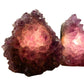 Detail shot of Grade A Amethyst polished crystals & decor under natural light