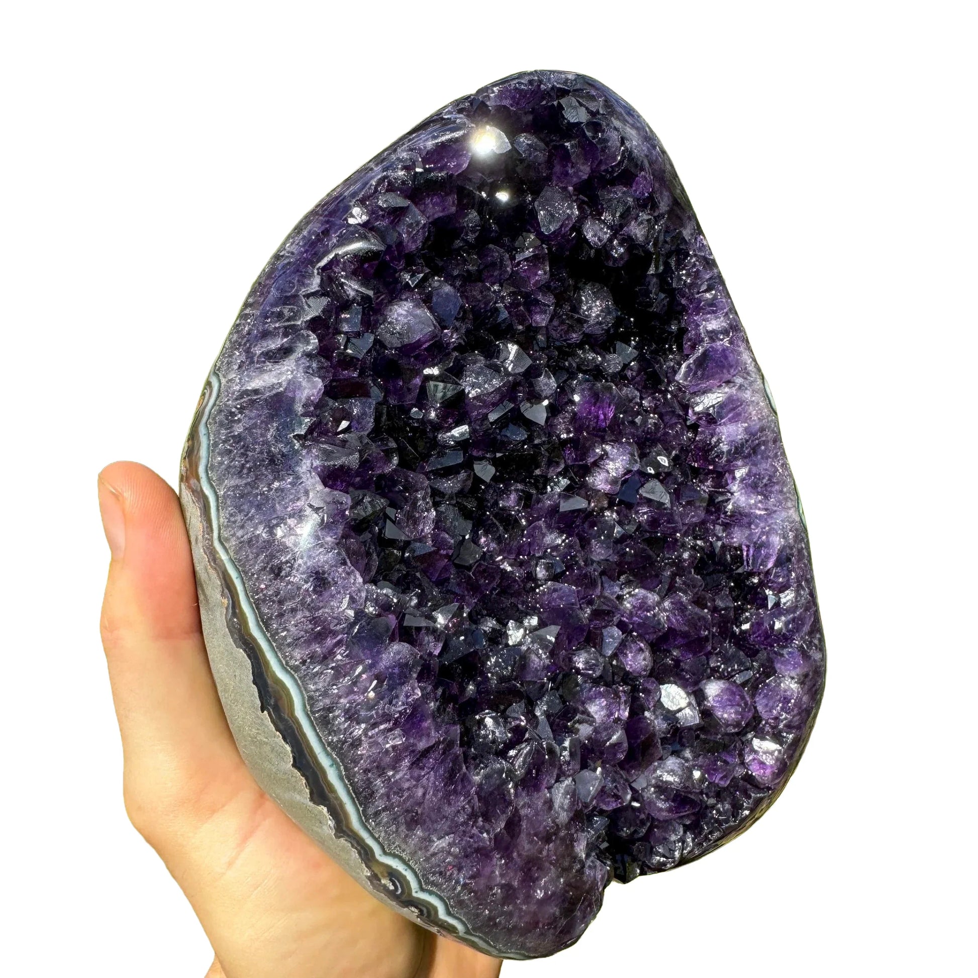 Top-side view of Amethyst raw geode, showing natural variation, kept close for Stress Relief and Sleep.