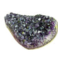Natural light view of a single Amethyst raw geode sourced from Uruguay.