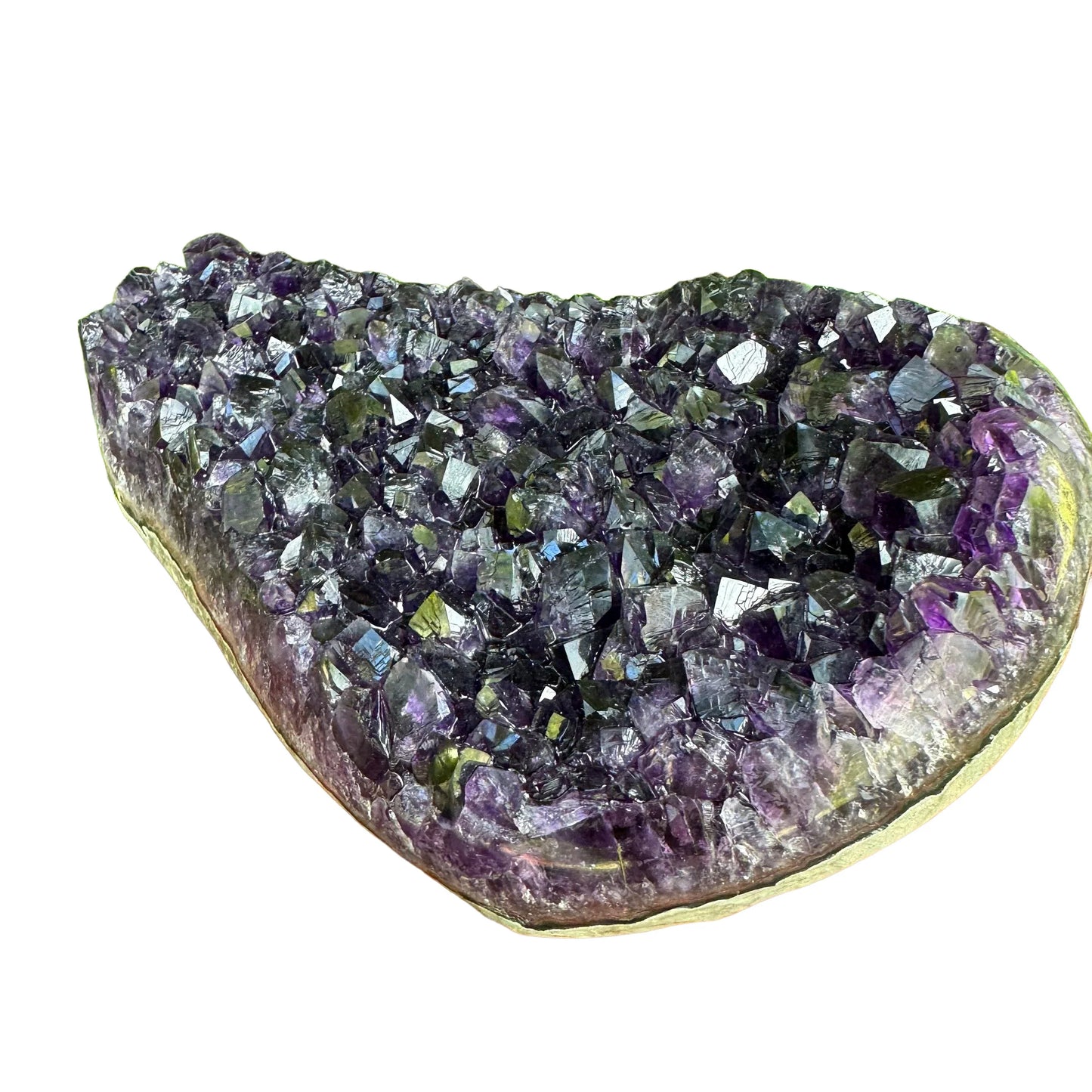 Natural light view of a single Amethyst raw geode sourced from Uruguay.
