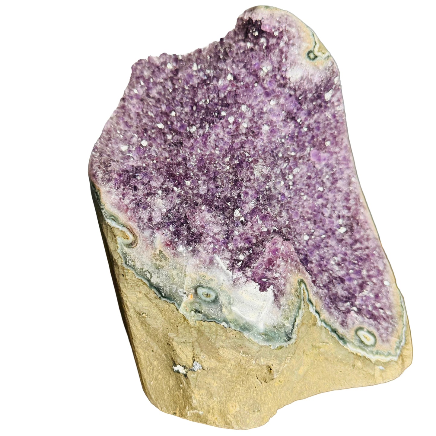 Top angle of Grade AA purple Amethyst raw geode, from Uruguay.