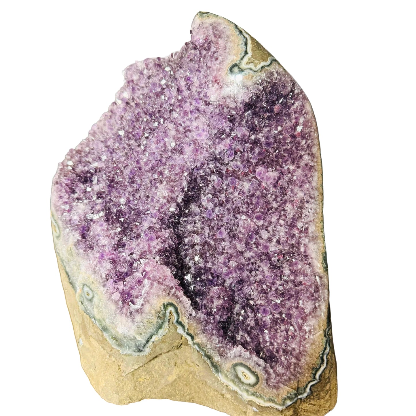 Size comparison with a Amethyst raw geode, from Uruguay.