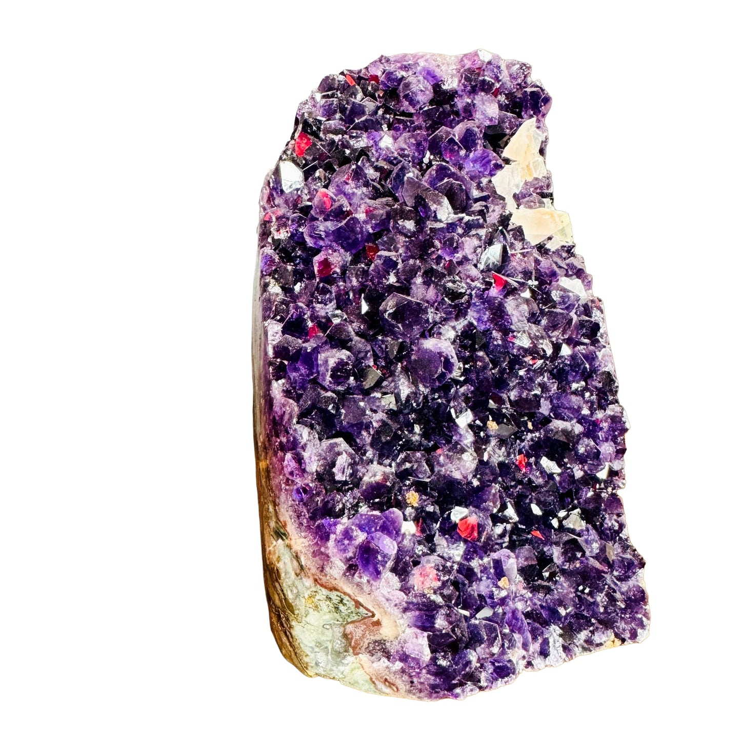 Side perspective of Amethyst raw geode, showing natural sheen.