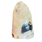 Grade aa amethyst geode held in hand for size reference
