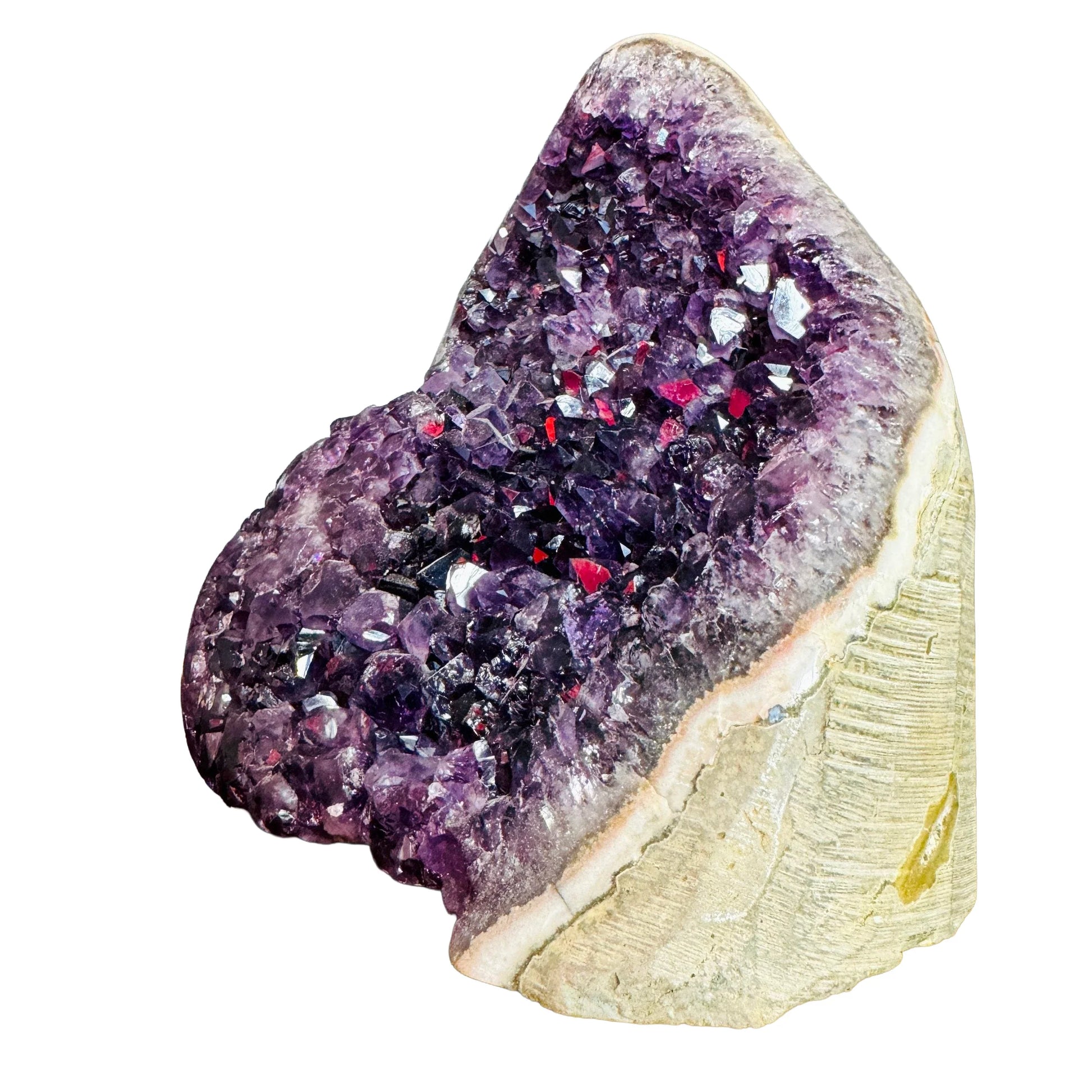 Lateral view of Grade AA Amethyst raw geode, carried for Stress Relief and Sleep, showing earthy tone.