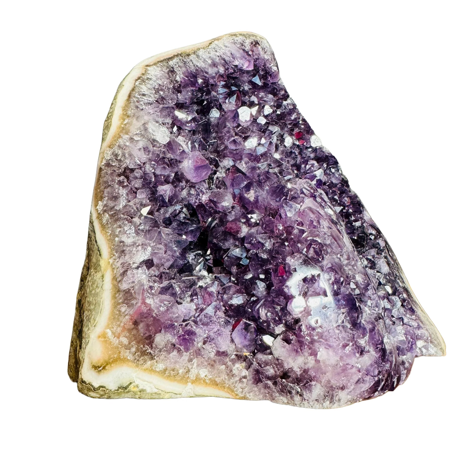 Underside detail of Amethyst raw geode, sourced from Artigas, Uruguay, showing raw matrix.