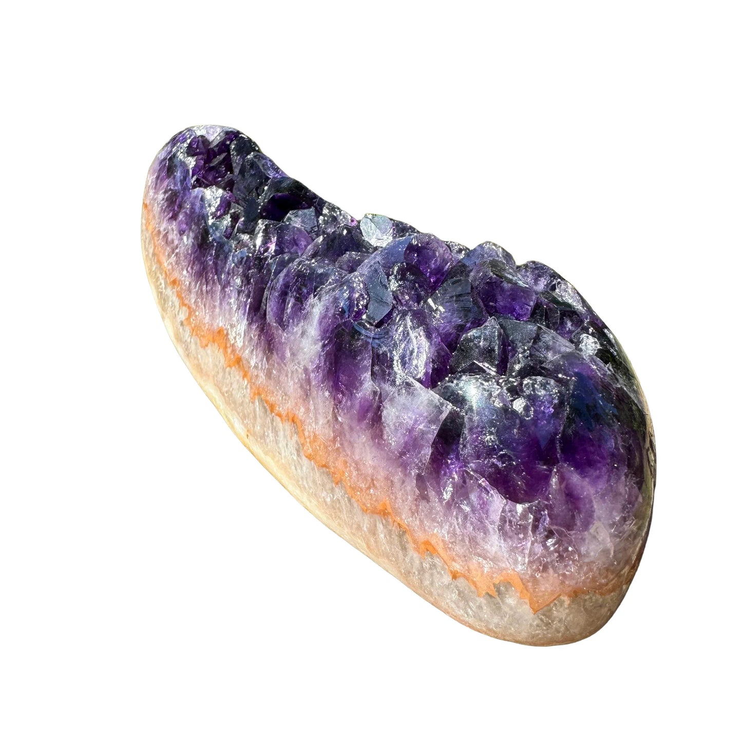 Profile view of purple Amethyst raw geode, showing natural variation, worked with for Stress Relief.