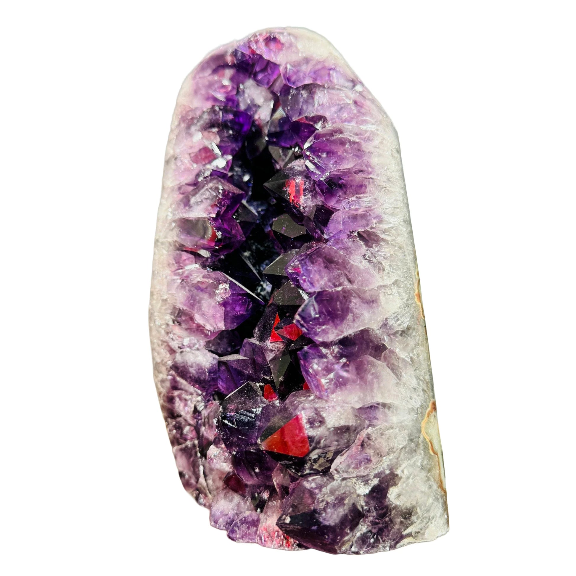 Held in hand, a Amethyst raw geode associated with Stress Relief.