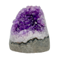 Close-up of Grade AA Amethyst polished freeform showing purple color depth and hand-finished surface