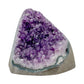 Profile view of Grade AA Amethyst polished freeform from Uruguay showing freeform shape and natural color zoning