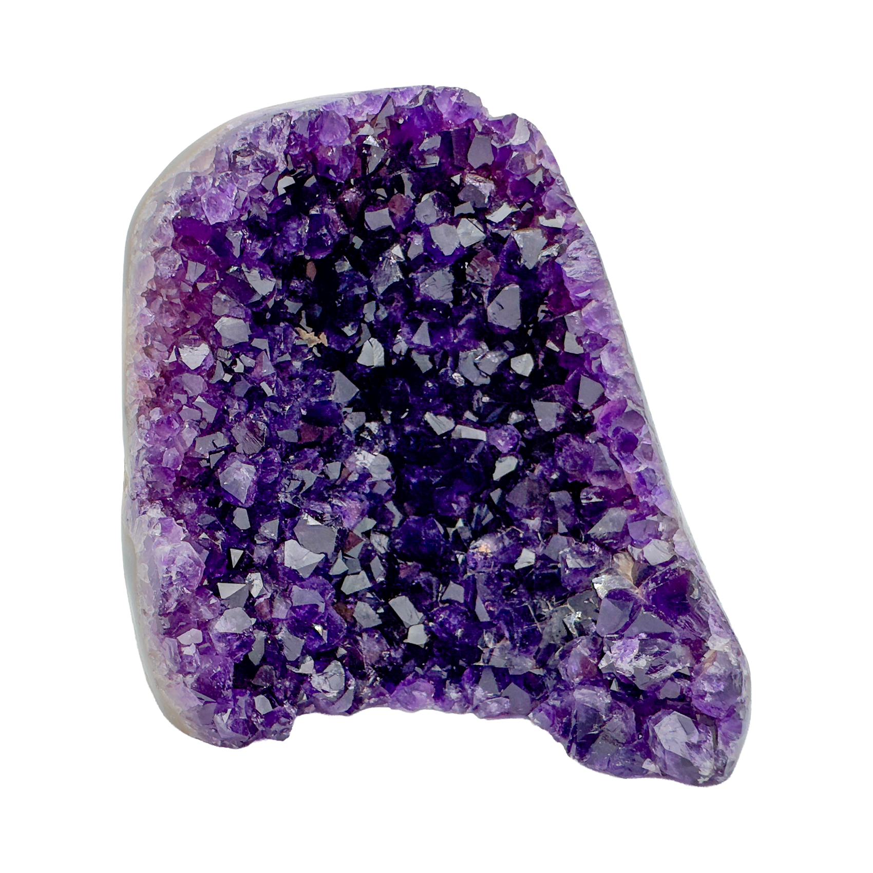 Close-up of Grade AAA Amethyst polished freeform showing top-tier purple saturation and crisp banding