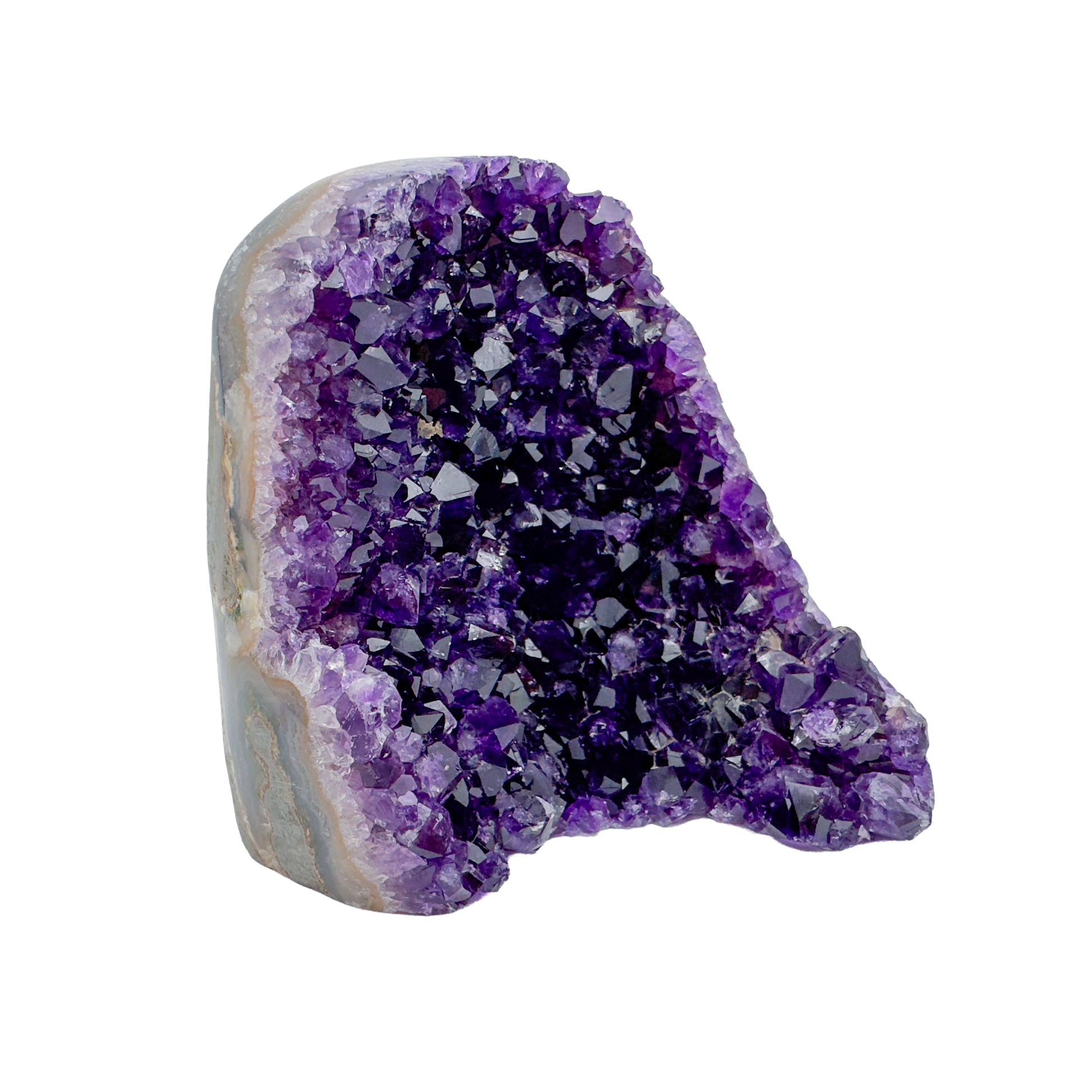 AAA polished amethyst geode from Artigas, Uruguay, deep violet druzy crystal face on a cut standing base