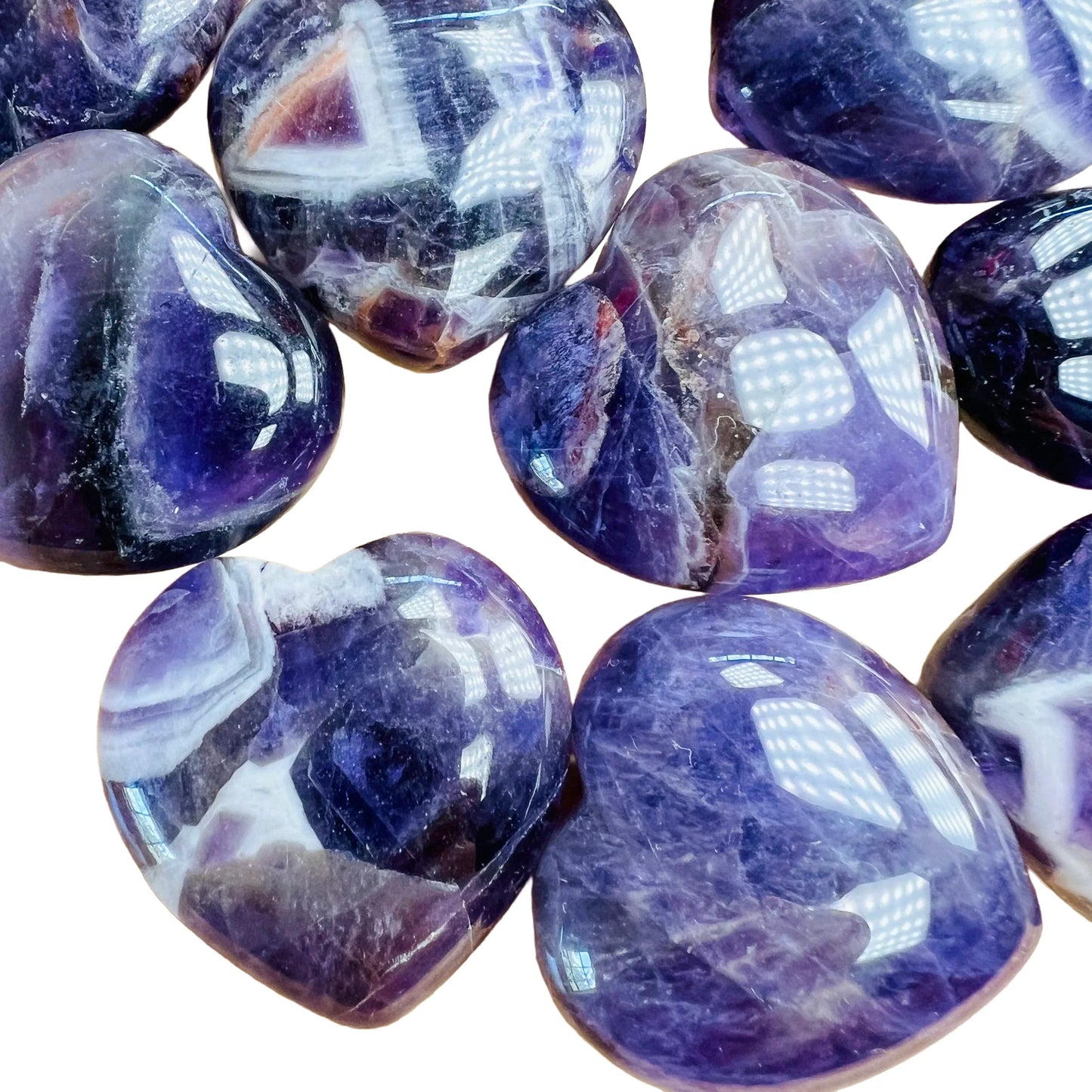 Close detail of purple Amethyst polished heart, from Analamanga, Madagascar.