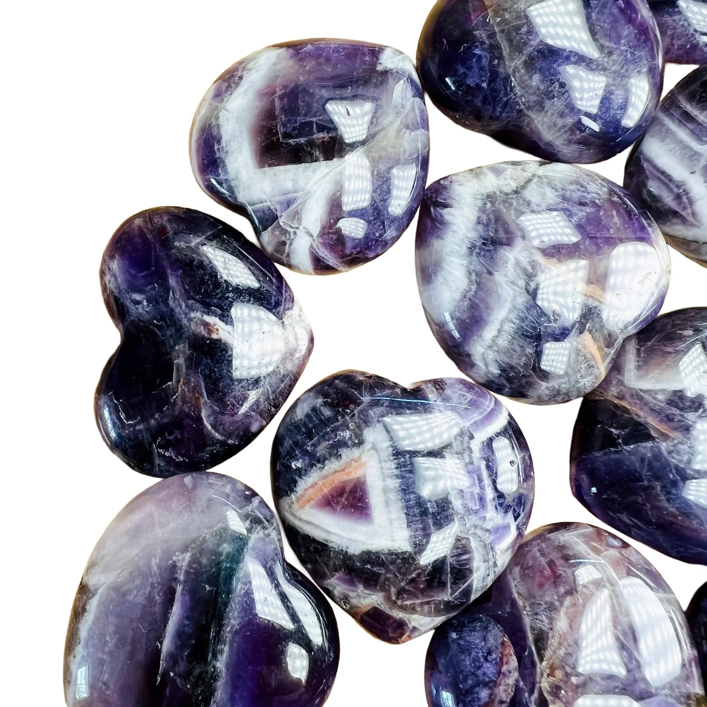 Edge view of Amethyst polished heart, kept close for Stress Relief and Sleep, showing translucent edges.
