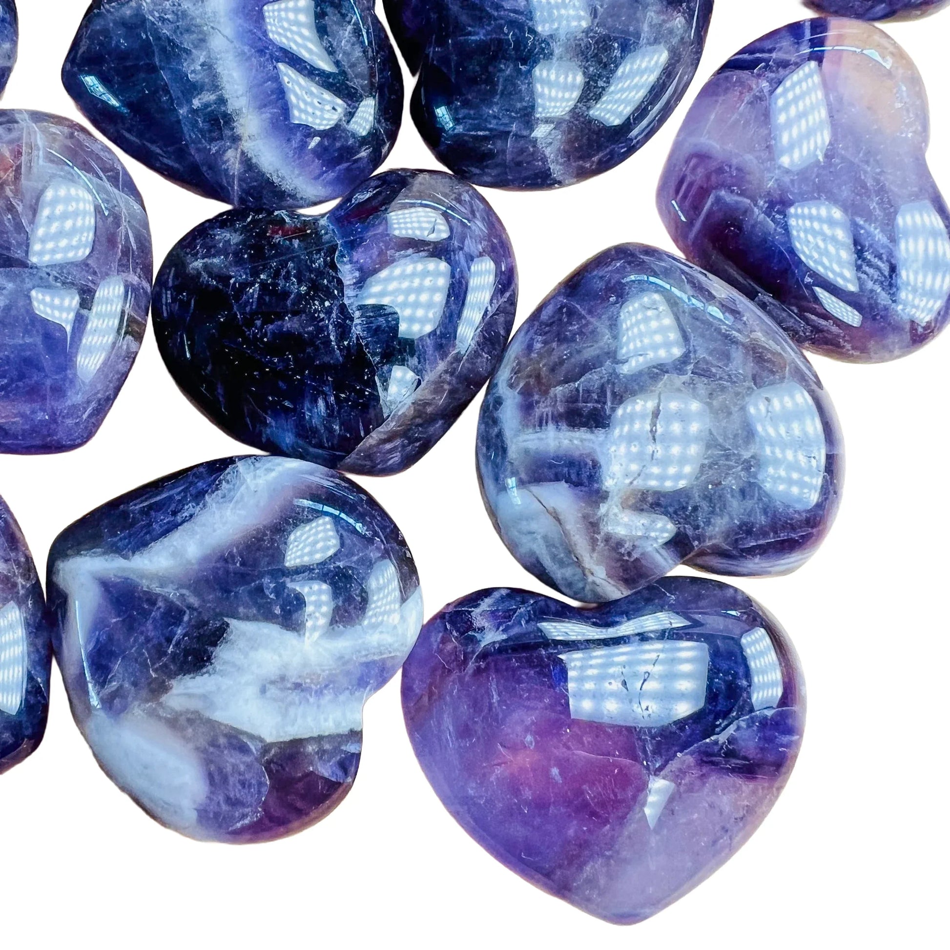 Bird's-eye view of Amethyst polished heart, showing translucent edges.