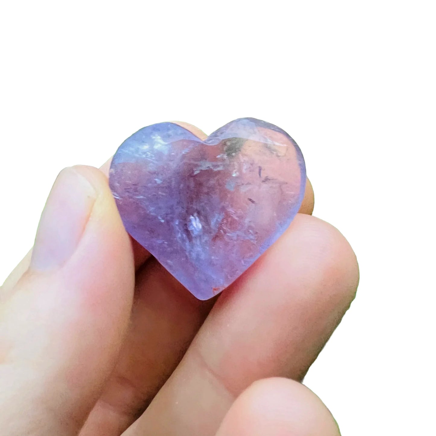 Side-on view of Amethyst polished heart, showing characteristic color, from Brazil.
