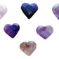 Overhead view of Amethyst polished heart, showing glassy finish, kept near for Stress Relief and Sleep.