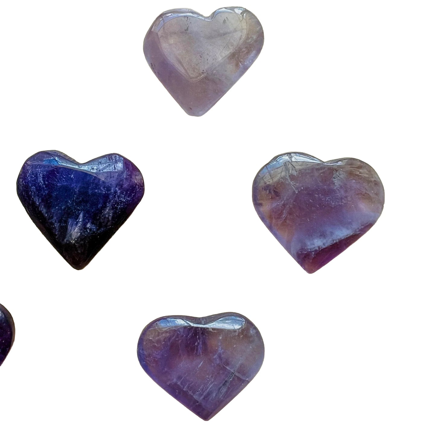 Hand-scale view of Amethyst stone, from Rio Grande do Sul, Brazil, shown for size reference.