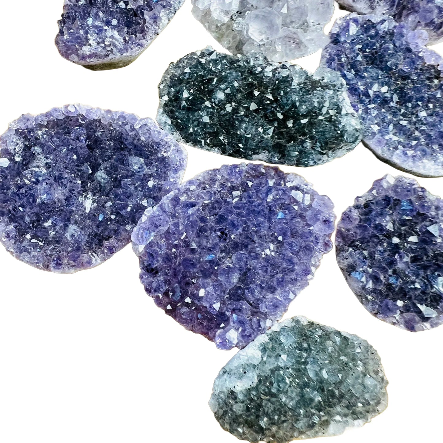 Grade a amethyst raw held in hand for size reference