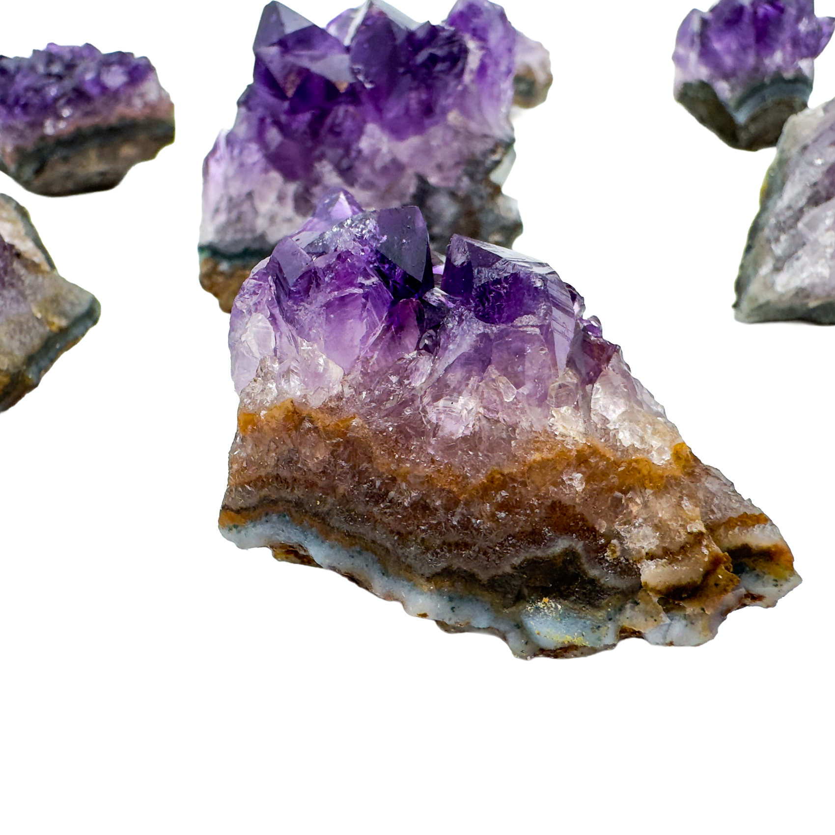 Pocket-friendly Amethyst clusters showing rich purple color and natural quartz druzy, sourced from Artigas, Uruguay