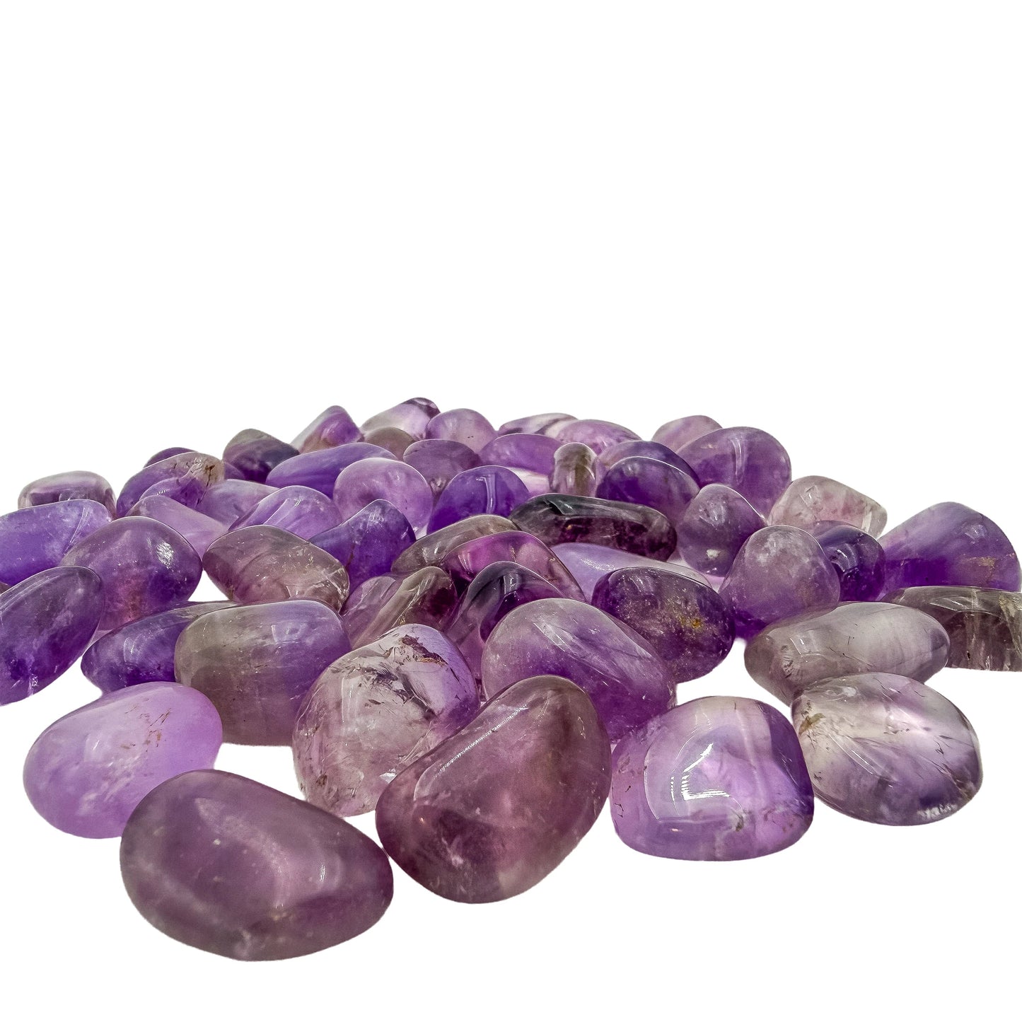Close detail on a group of Amethyst tumbled stones showing chevron banding