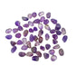 Overhead flat-lay of Amethyst tumbled stones, 40 to 64 pieces a pound