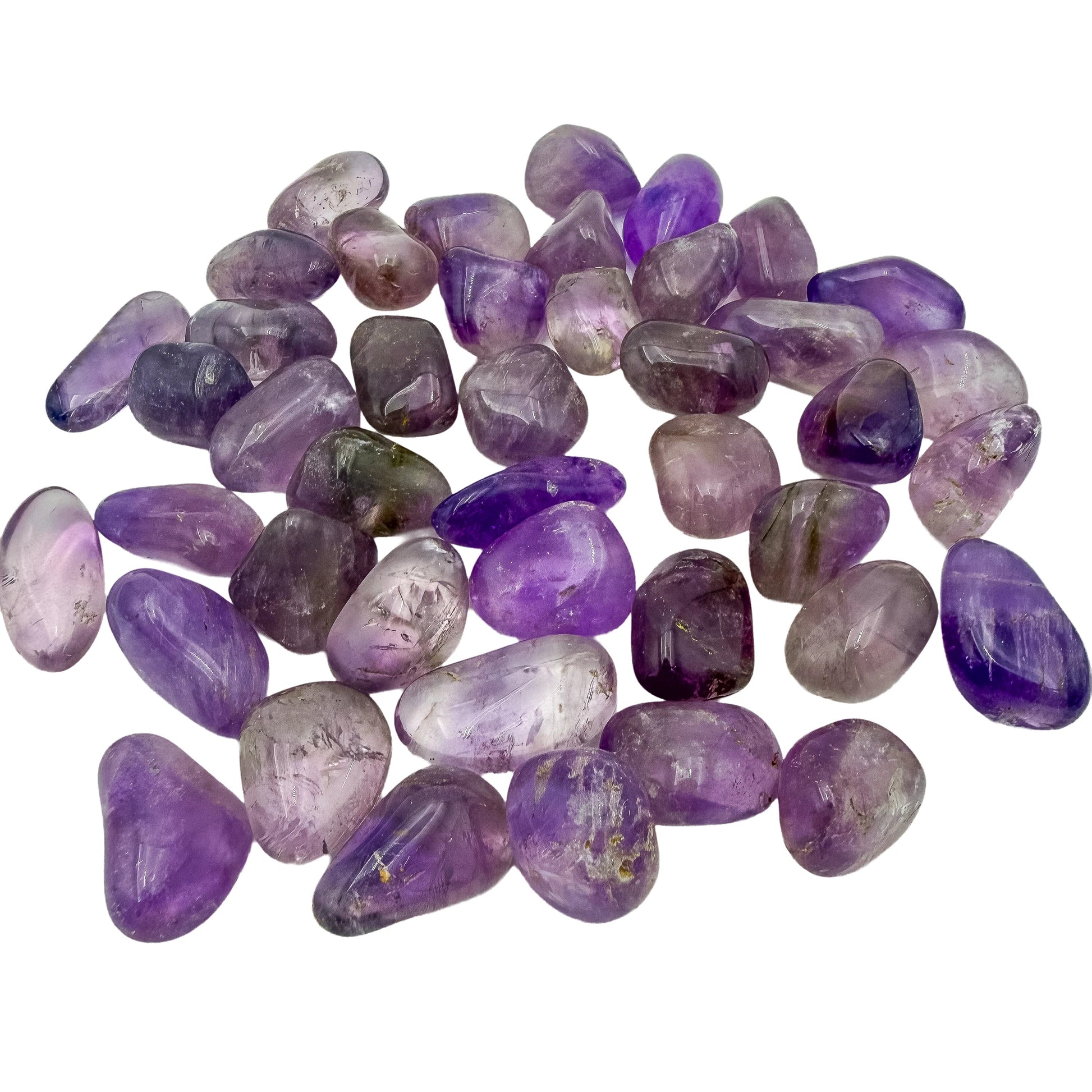 Angled view across pocket-size Amethyst tumbles with visible banding
