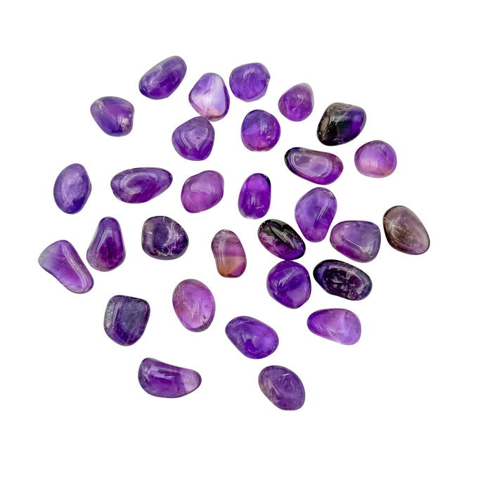 Tight crop on a single Ametrine tumble from Bolivia, untreated natural colour