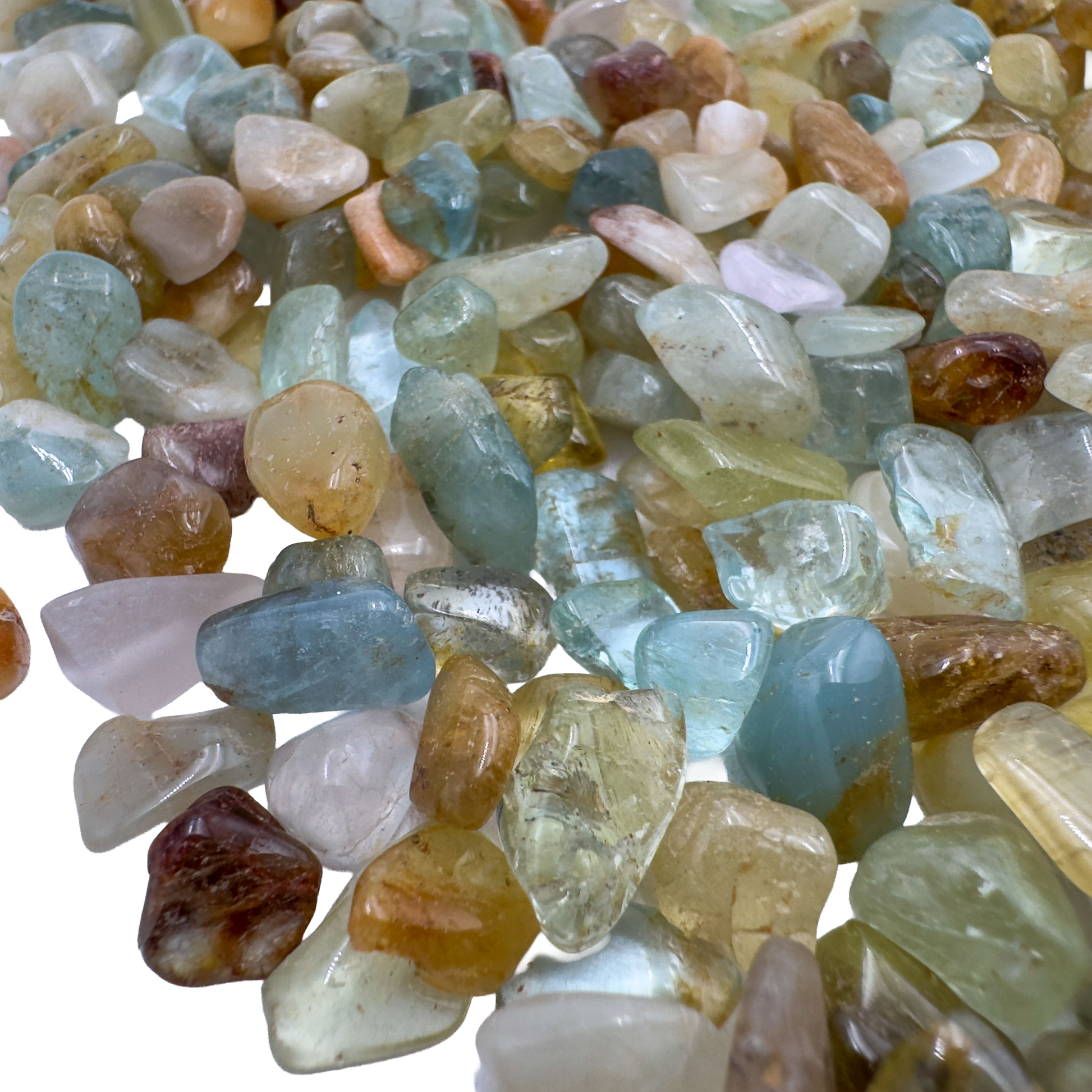 Top-side view of Grade A Aquamarine polished chip, from Huila, Angola, showing natural variation.