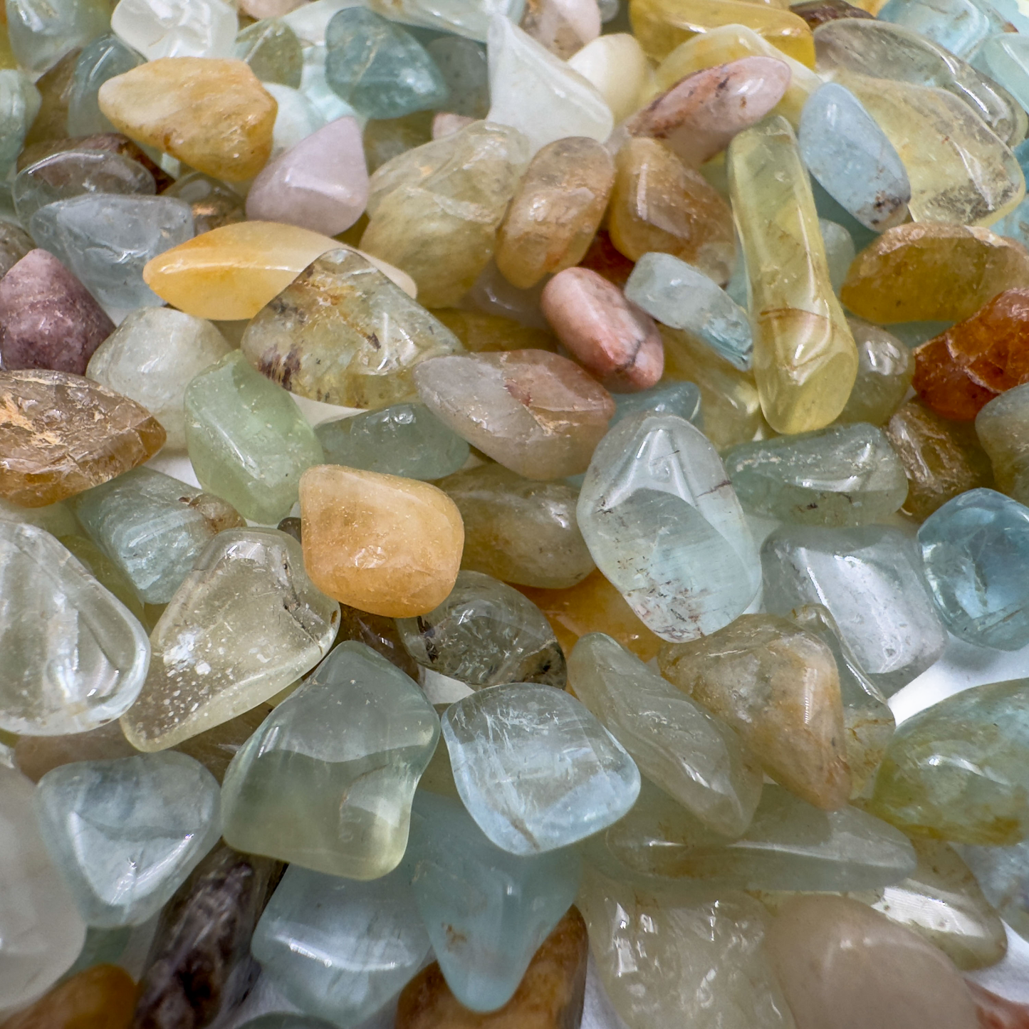 Underside view of blue Aquamarine polished chip, hand-selected from Huila, Angola.