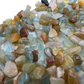 Scale reference of a Aquamarine polished chip associated with Courage and Clarity.