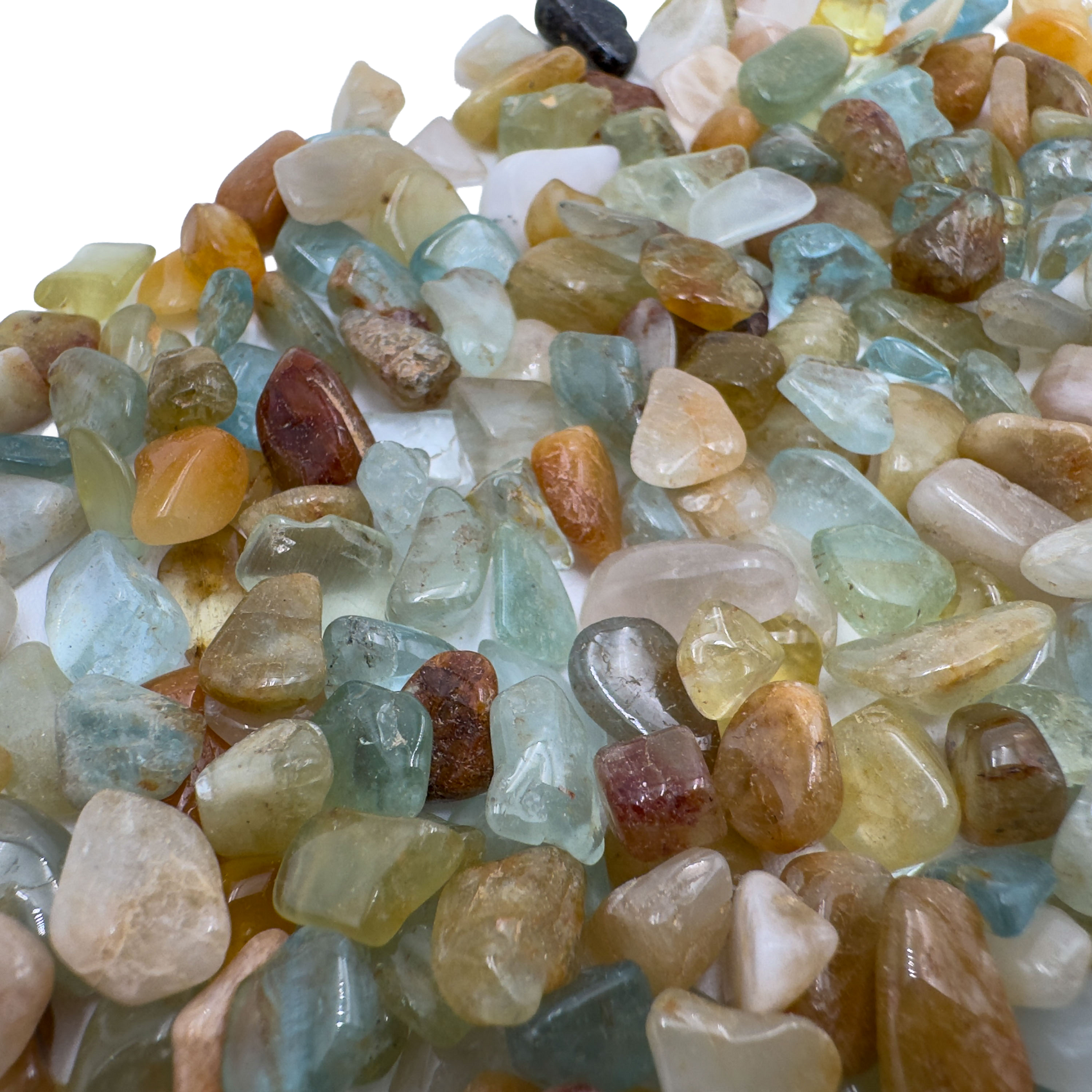 Scale reference of a Aquamarine polished chip associated with Courage and Clarity.