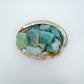 Side-on view of Aquamarine raw stone, to support Stress Relief and Emotional Healing, sourced from Brazil.