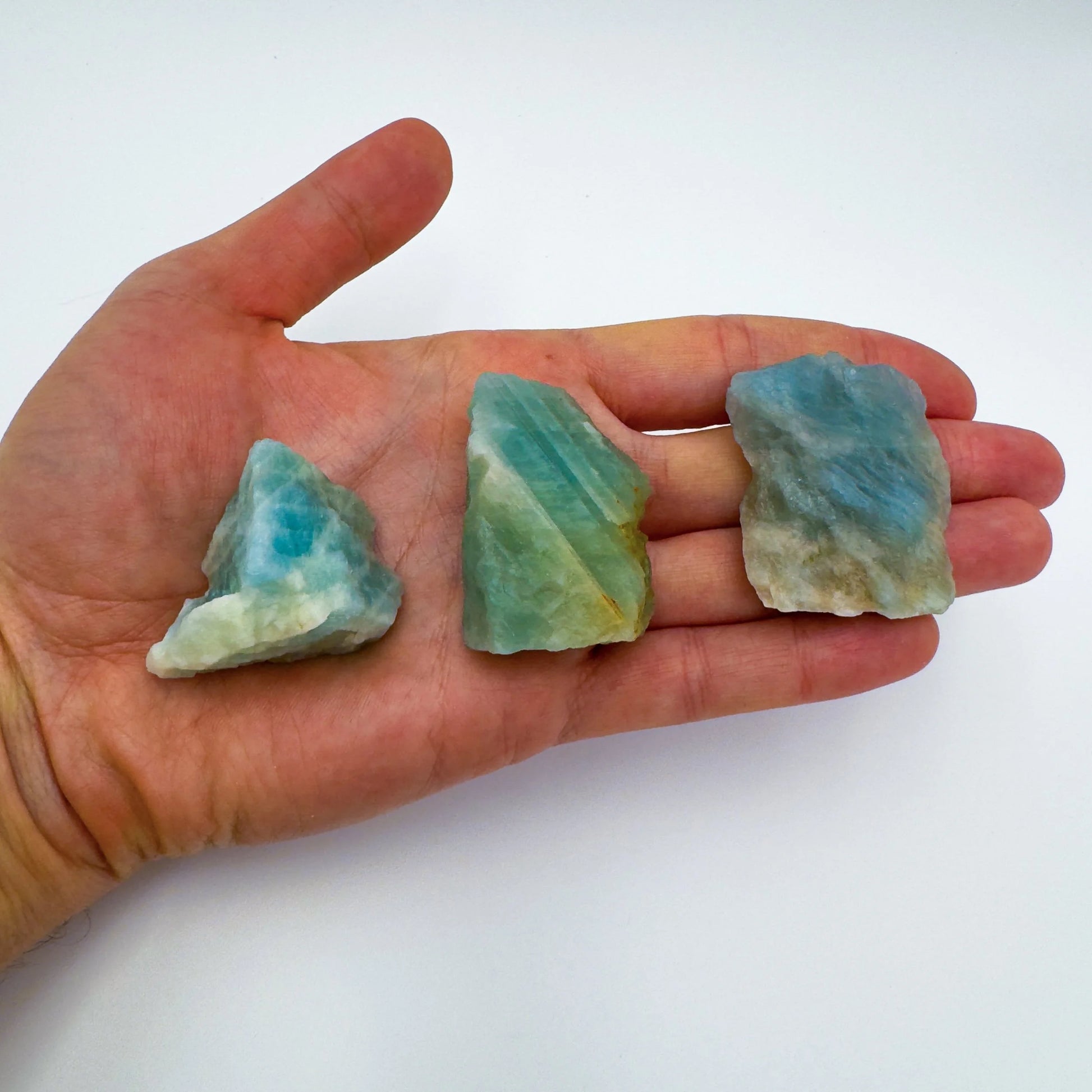 Back view of Grade AA Aquamarine raw showing natural surface